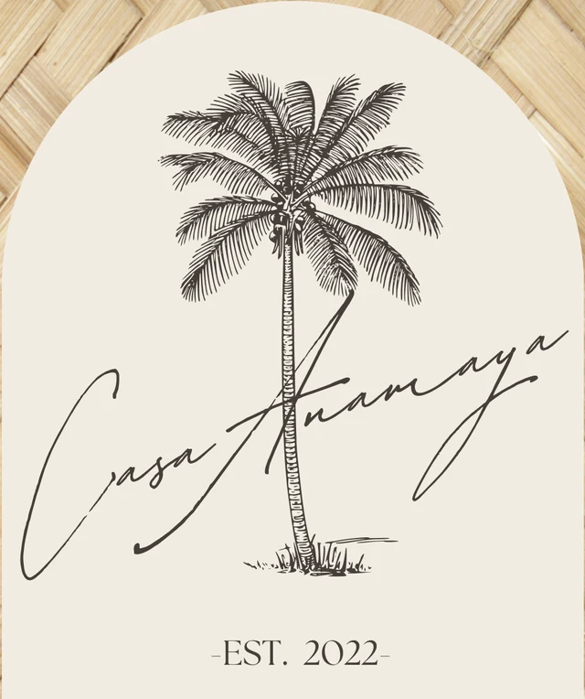 Casa Anamaya, est. 2022: una palmera a tinta con el nombre en letra de firma
